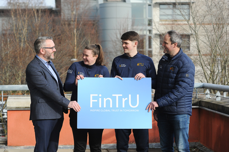 Two ATU Donegal Sport players with Sylvester Clancy and Michael Murphy
