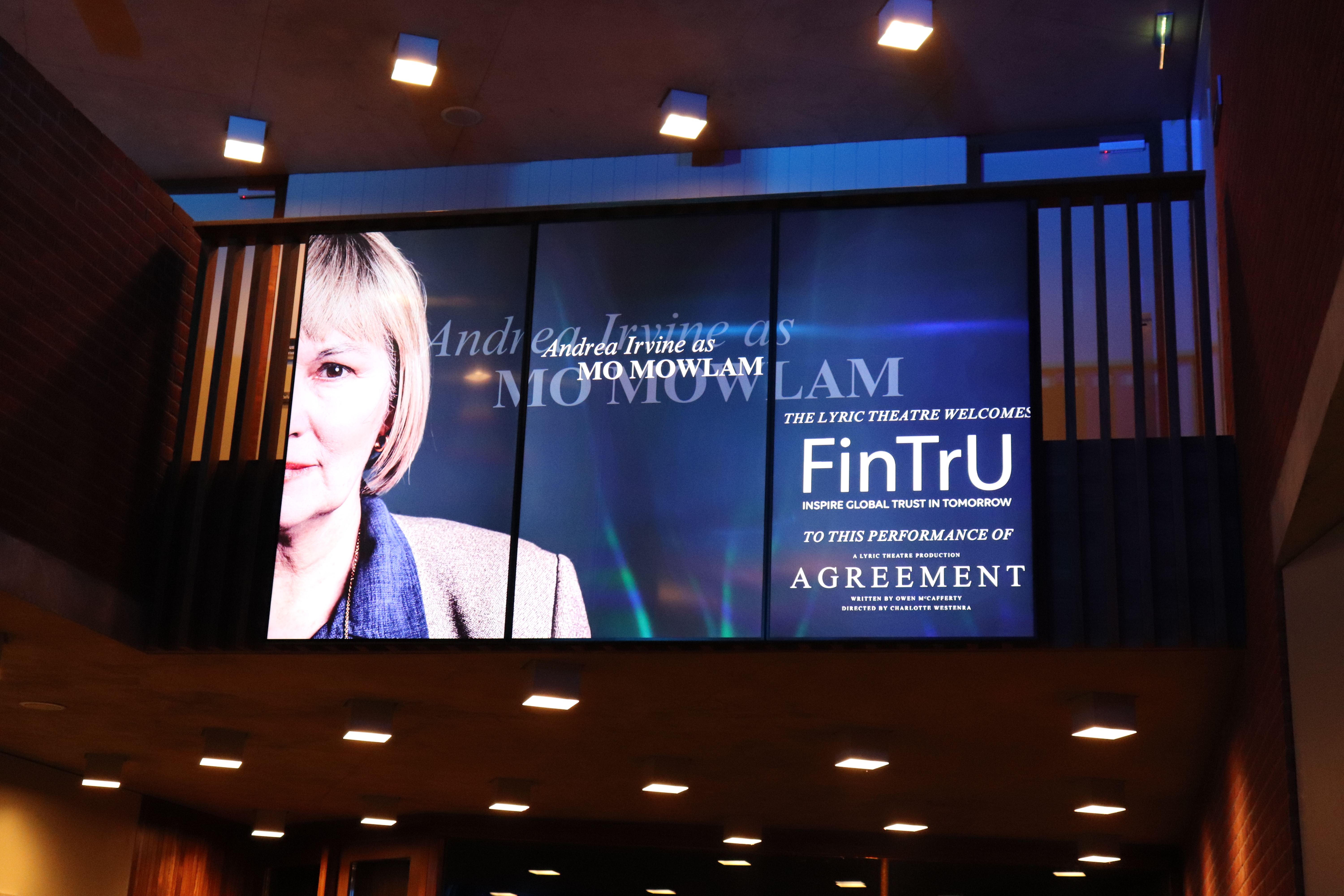 Digital board with Andrea Irvine at the Agreement production lyric theatre, in Belfast