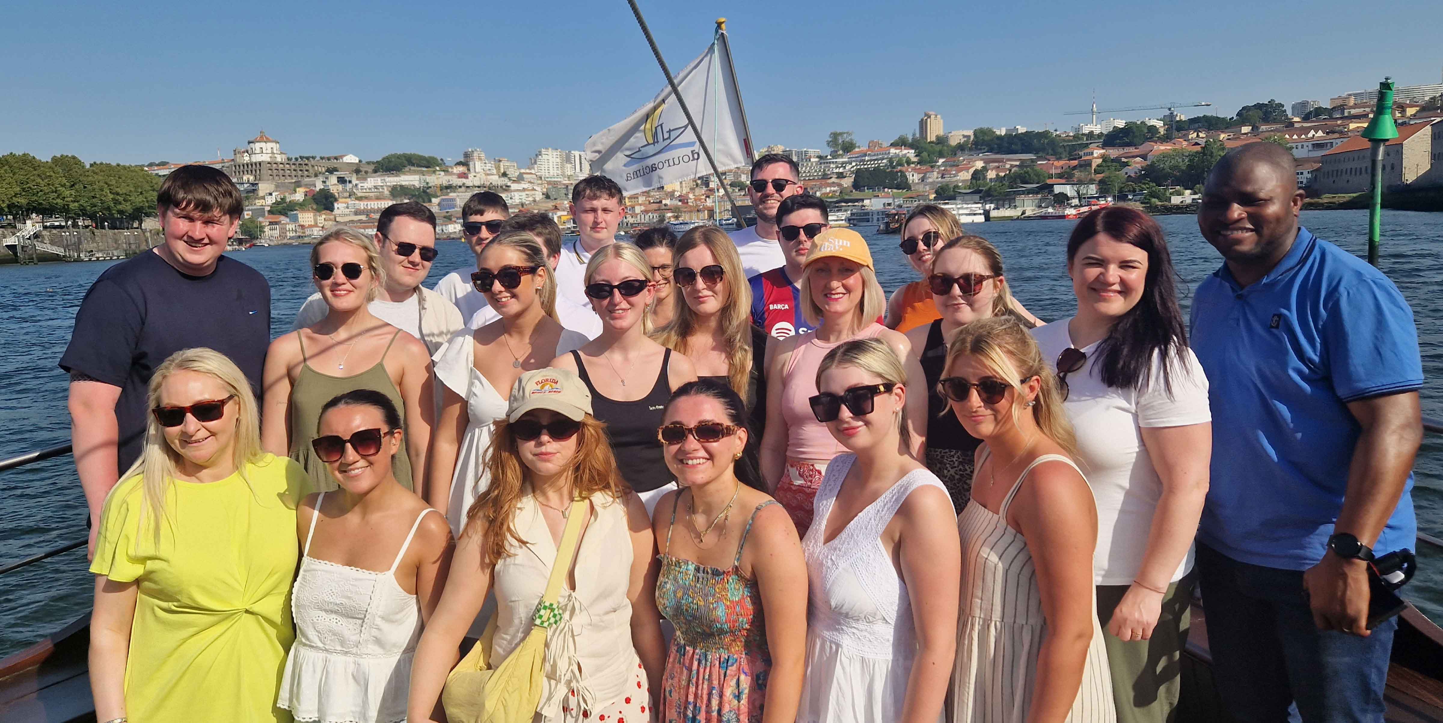 group of graduates in a boot trip