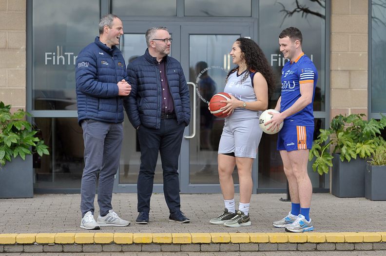 ATU Sport Donegal trainer with FinTrU Letterkenny site lead, chatting with two players